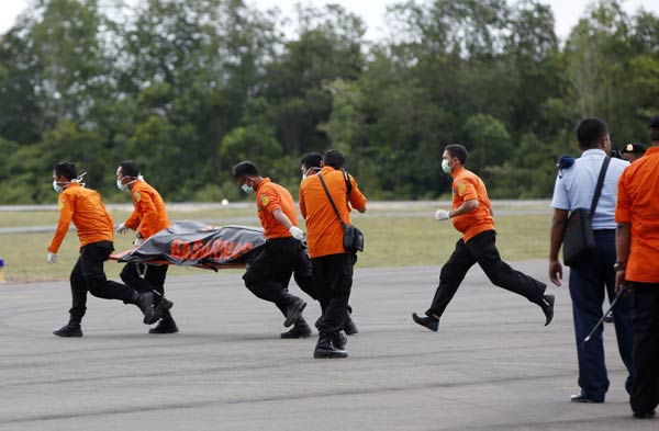 AirAsia victim with life jacket raises questions about plane's last moments