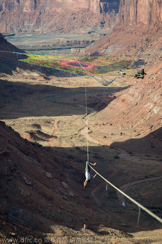 Daredevils run, jump and hurl themselves into 400ft canyons