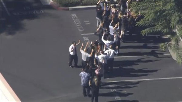 Shooting rampage at California social services agency leaves 14 dead, 17 wounded