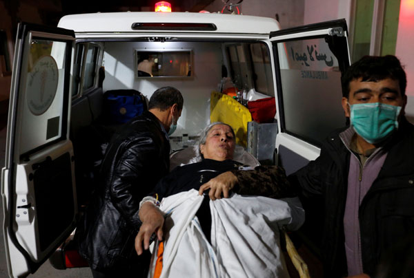 Taliban attack near Afghan parliament kills more than 30