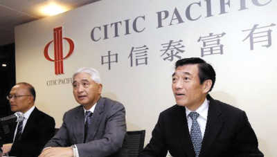 中信泰富巨虧促人事地震:榮智健辭職 常振明接任