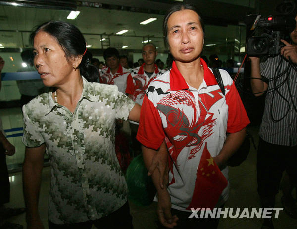 59名被扣中國漁民安全回國[組圖]